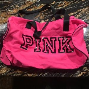 Athletic pink bag with water bottle